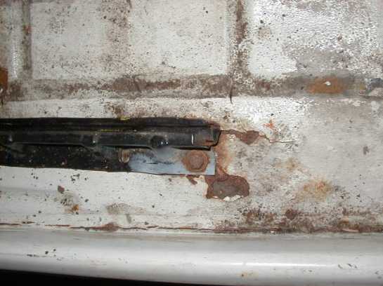 Picture 4 Dangerously rusted loose seat runner