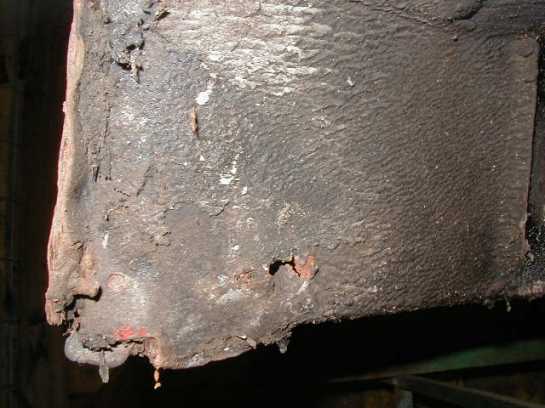 Picture 2 Rust on the rear end of the rocker panel
