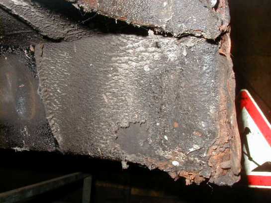 Picture 1 Rust on the rear end of the rocker panel