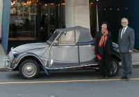 The United Nations Ambassador for Latvia with his wife and 2CV
