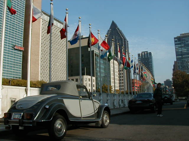 Some of the UN flags and the 2CV