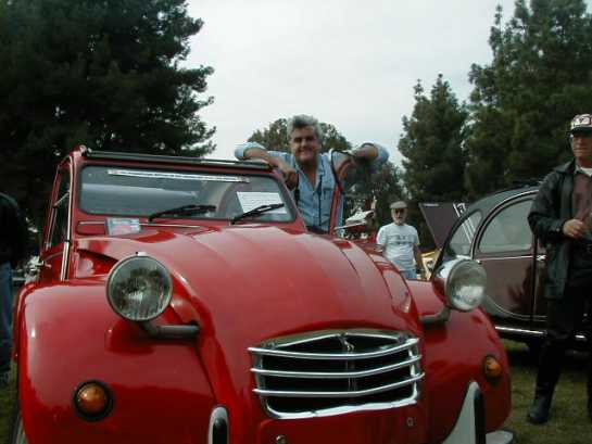 Jay Leno posing with our 2CV